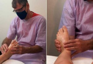 Massagem aplicada nos pés de uma hóspede